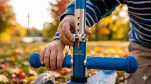 Close-up of adjustable T-bar handlebars on a toddler scooter, ideal for growing Canadian kids.