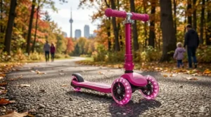Vibrant pink 3 wheel scooter featuring an adjustable T-bar handlebar and ergonomic grips for small hands.