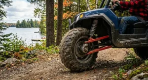 Close-up of rugged rubber tires on a kids' all-terrain ride-on vehicle.