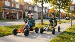 Two children aged 6 and 8 racing different colored pedal go karts down a sidewalk in a friendly Canadian neighborhood competition.