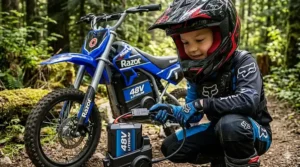 Close-up of an easy-to-charge battery on an electric dirt bike for kids.