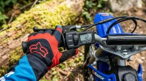 Adjustable speed settings on an electric dirt bike for kids.