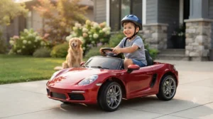 Side profile focusing on the detailed multi-spoke alloy wheel and tire of the red 12v ride on sports car.