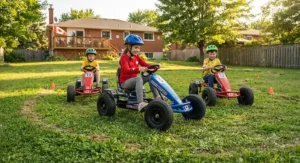 Four-wheel pneumatic tire design on pedal go-karts for backyard racing ensuring maximum stability on grass.