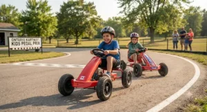 Two children having fun racing their pedal go-kart for kids models on a sunny weekend afternoon in Ontario.