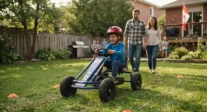 A young child wearing a helmet while driving pedal go-karts for backyard racing with family supervision.