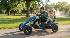 Action illustration of two siblings pedalling happily together in a multi-speed two-seater pedal go-kart for siblings.